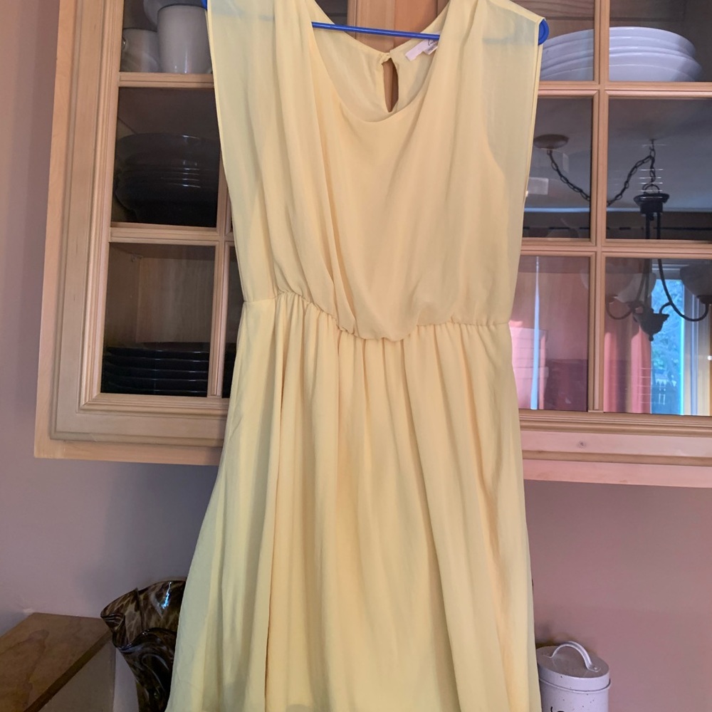 Pale yellow dress. By Lush.